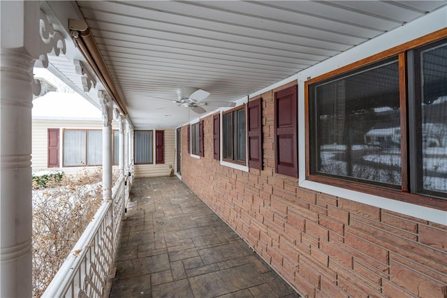 view of patio featuring ceiling fan