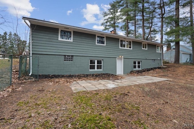 rear view of house with a patio