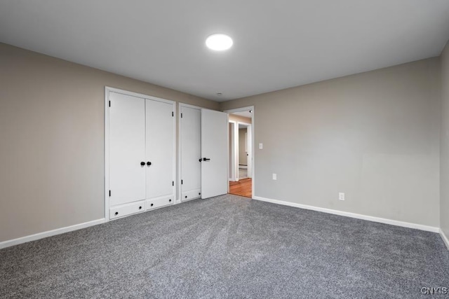 unfurnished bedroom with carpet floors