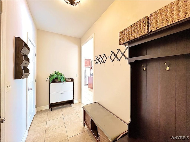 mudroom with light tile patterned floors