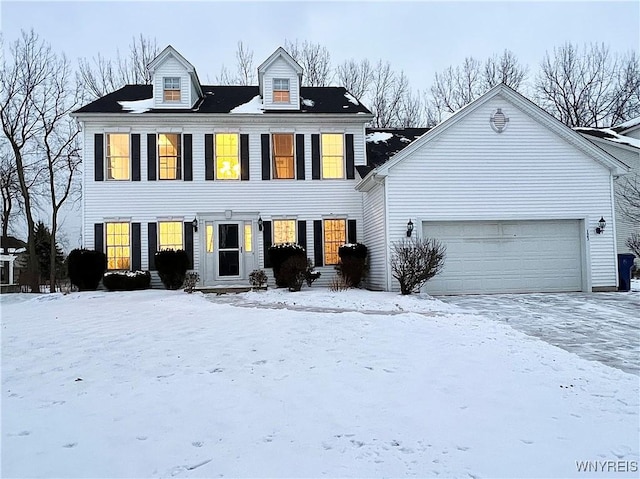 colonial house featuring a garage