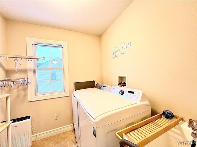 laundry room featuring washer and clothes dryer