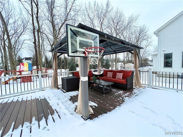 snow covered deck with outdoor lounge area