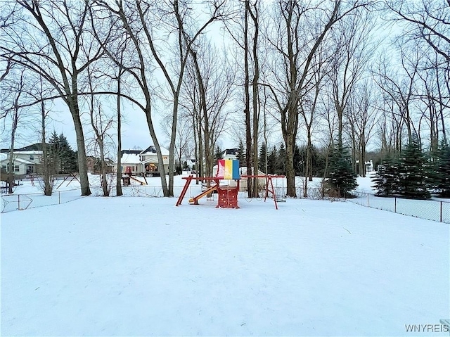 view of snow covered playground