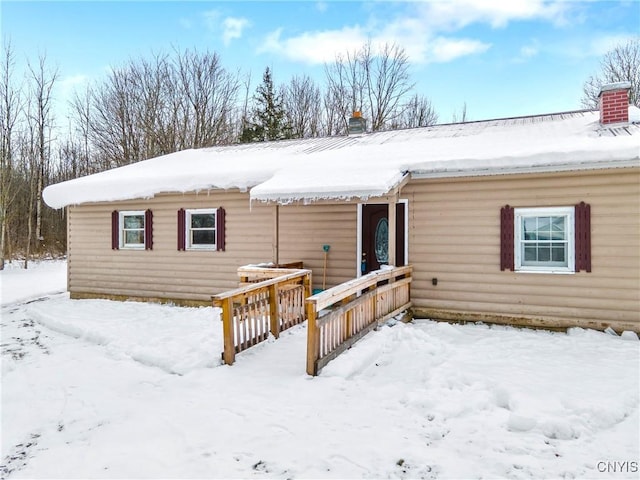 view of snow covered property