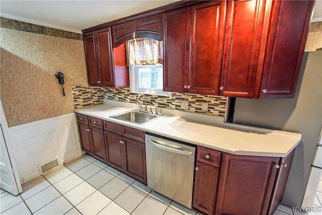 kitchen with stainless steel dishwasher and sink