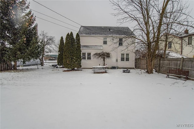 view of snow covered house