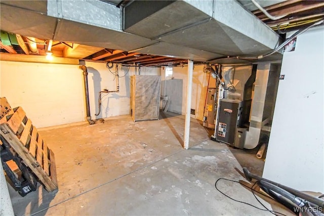 basement featuring gas water heater