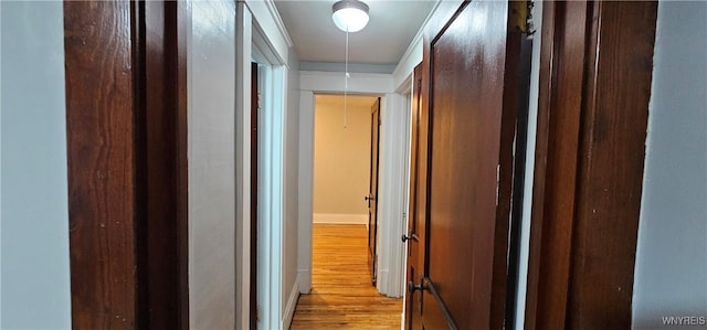 hallway featuring light wood-type flooring