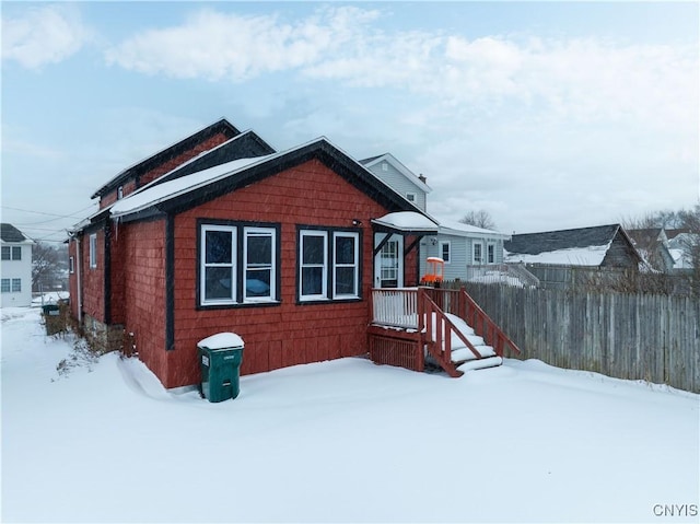 view of snow covered property