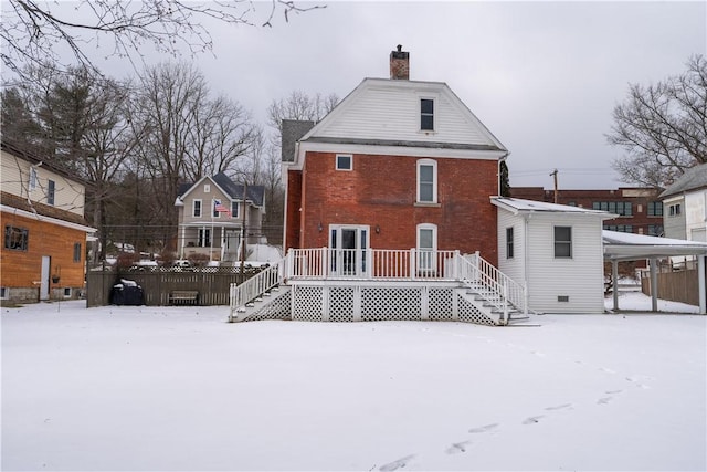 view of snow covered property