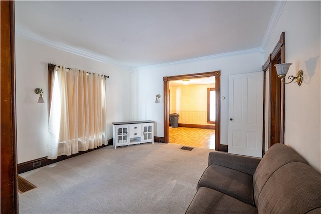 carpeted living room with crown molding