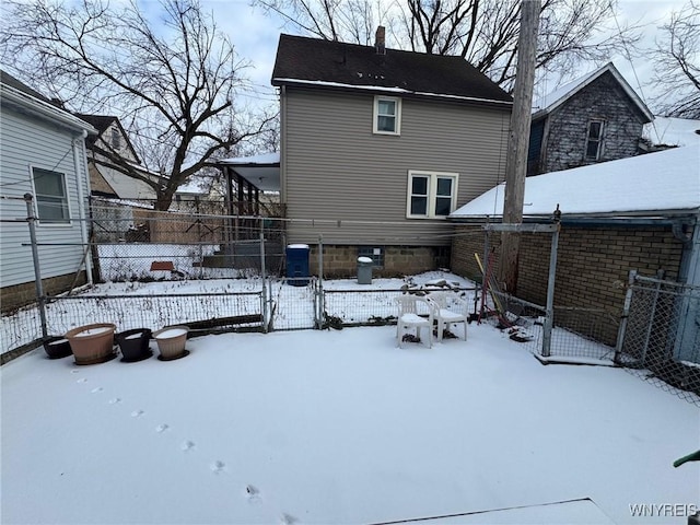 view of snow covered house