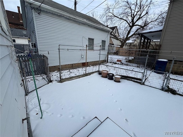 view of yard covered in snow