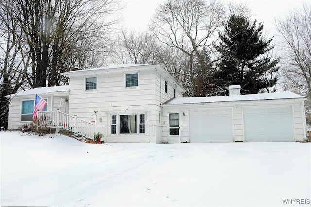 split level home featuring a garage