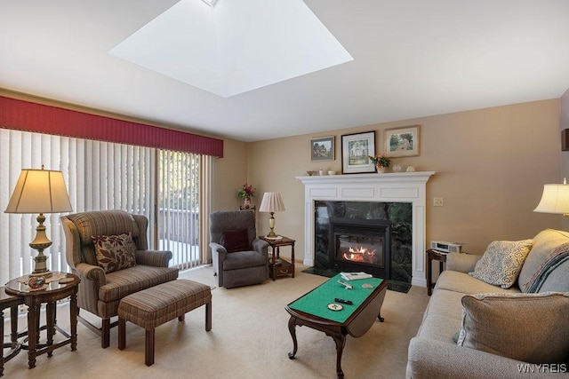 living room with light carpet and a fireplace