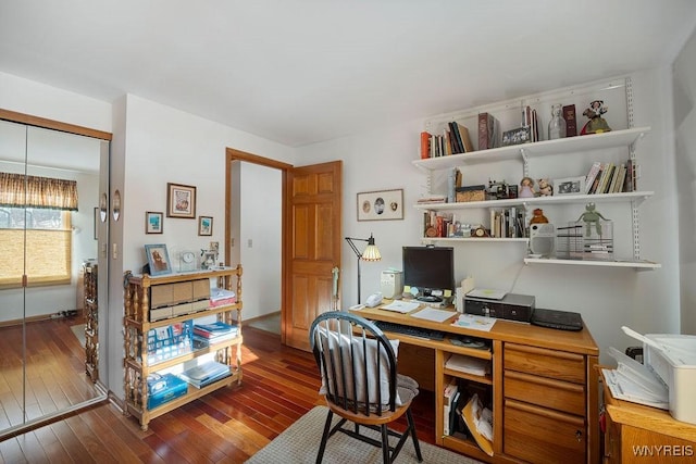 office space with dark wood-type flooring