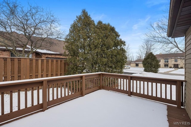 view of snow covered deck