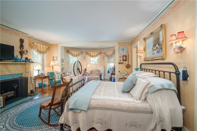 bedroom with crown molding and wood-type flooring