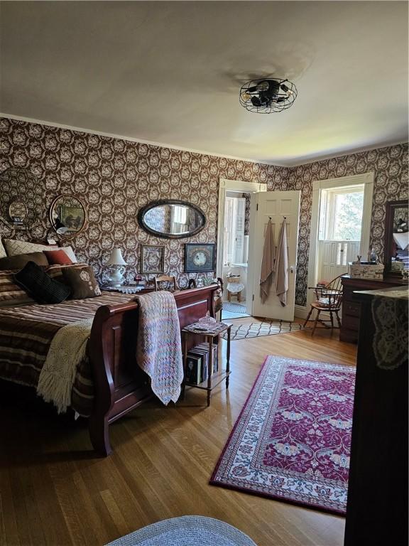 bedroom with light hardwood / wood-style flooring