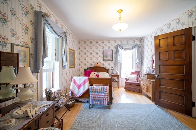 bedroom with light wood-type flooring