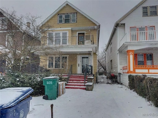 view of front of house with a balcony