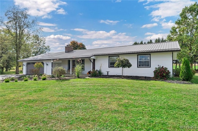 single story home with a front yard and a garage