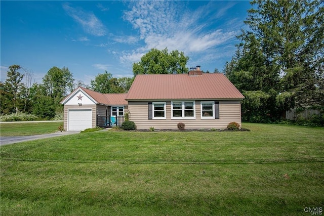 view of front facade featuring a front lawn and a garage