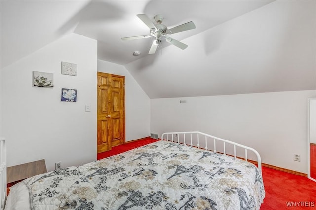 carpeted bedroom with ceiling fan and lofted ceiling