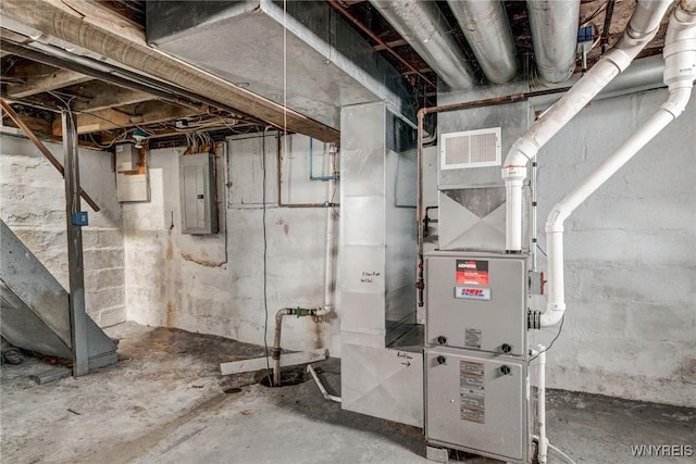 utility room featuring electric panel