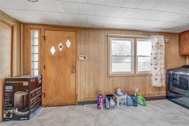 entrance foyer with wooden walls