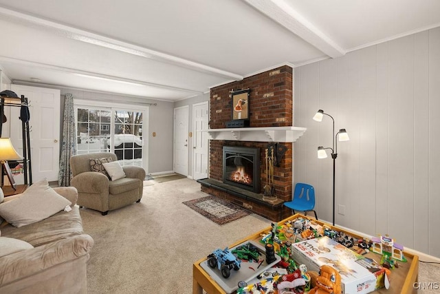 carpeted living room with beam ceiling and a brick fireplace