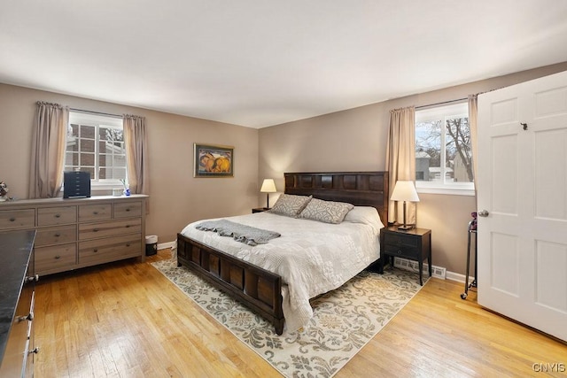 bedroom with light hardwood / wood-style floors