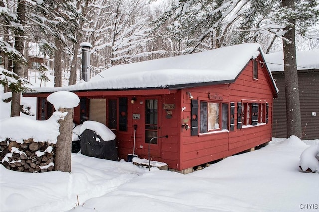 view of snow covered property