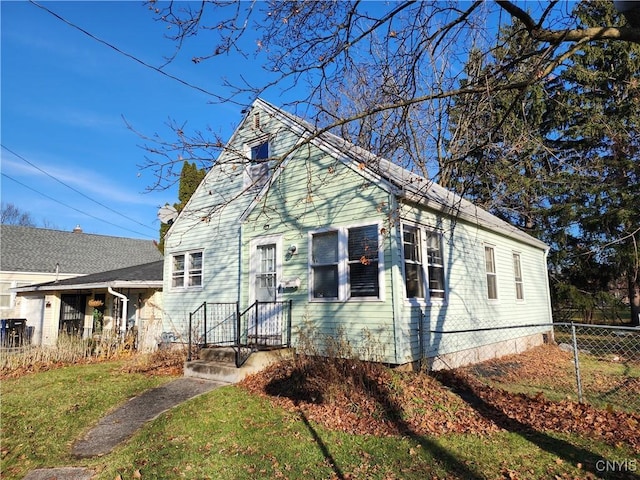 view of property exterior featuring a lawn