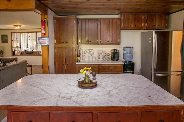 kitchen featuring stainless steel refrigerator