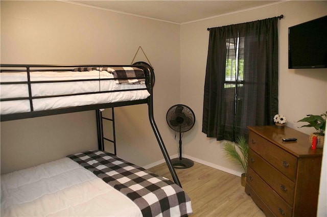 bedroom with light hardwood / wood-style floors