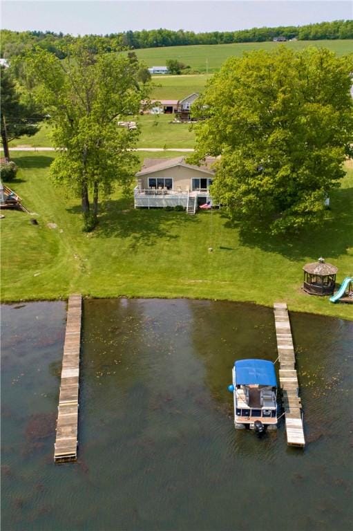 aerial view featuring a rural view and a water view