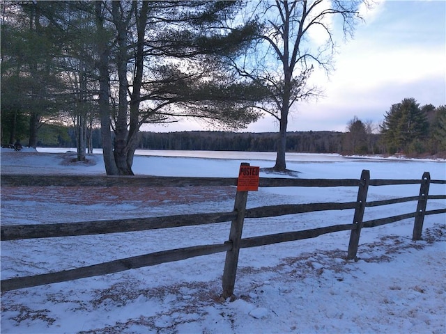 view of yard layered in snow