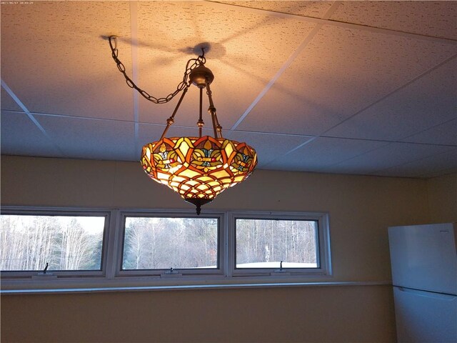 197 Clendenning Rd, Colesville, NY 13787 - interior details featuring freestanding refrigerator and a drop ceiling
