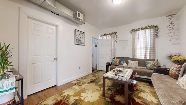 living room with light hardwood / wood-style floors