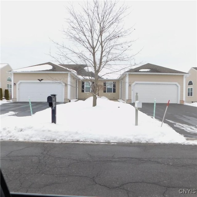 single story home with a garage