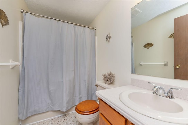 full bathroom with toilet, shower / bathtub combination with curtain, and vanity