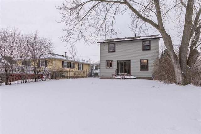 view of snow covered property