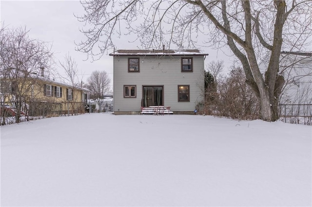 view of snow covered property