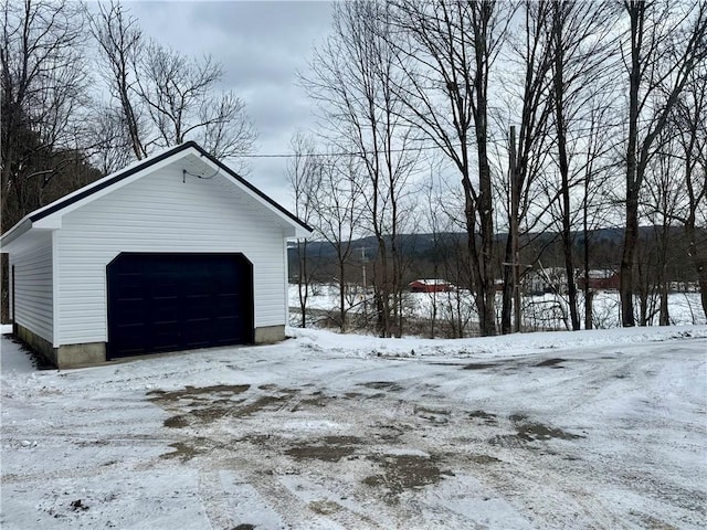 view of snow covered garage