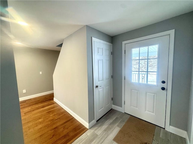 entryway with light hardwood / wood-style floors