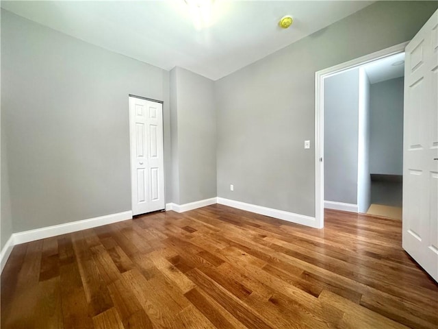 empty room featuring hardwood / wood-style floors