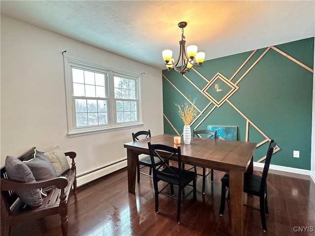 dining area with a baseboard heating unit, dark wood-type flooring, and a chandelier