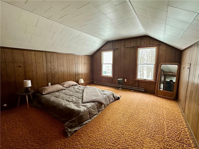 unfurnished bedroom with a baseboard heating unit, lofted ceiling, and carpet floors